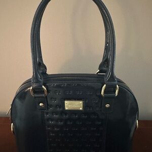 St. John Navy blue patent purse.